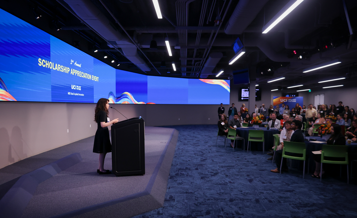 Carousel Photo 1: Alexia Ventura speaking at a scholarship donor appreciation event (2024)