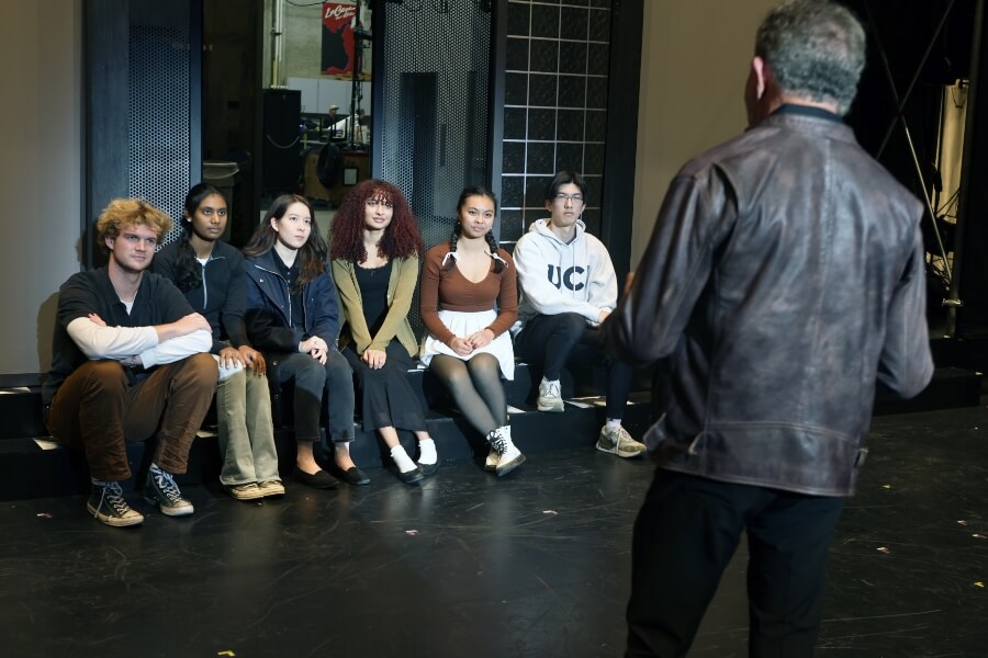 Carousel Photo 5: Alexia Ventura touring the Irvine Barclay Theatre with other scholarship recipients (2024)